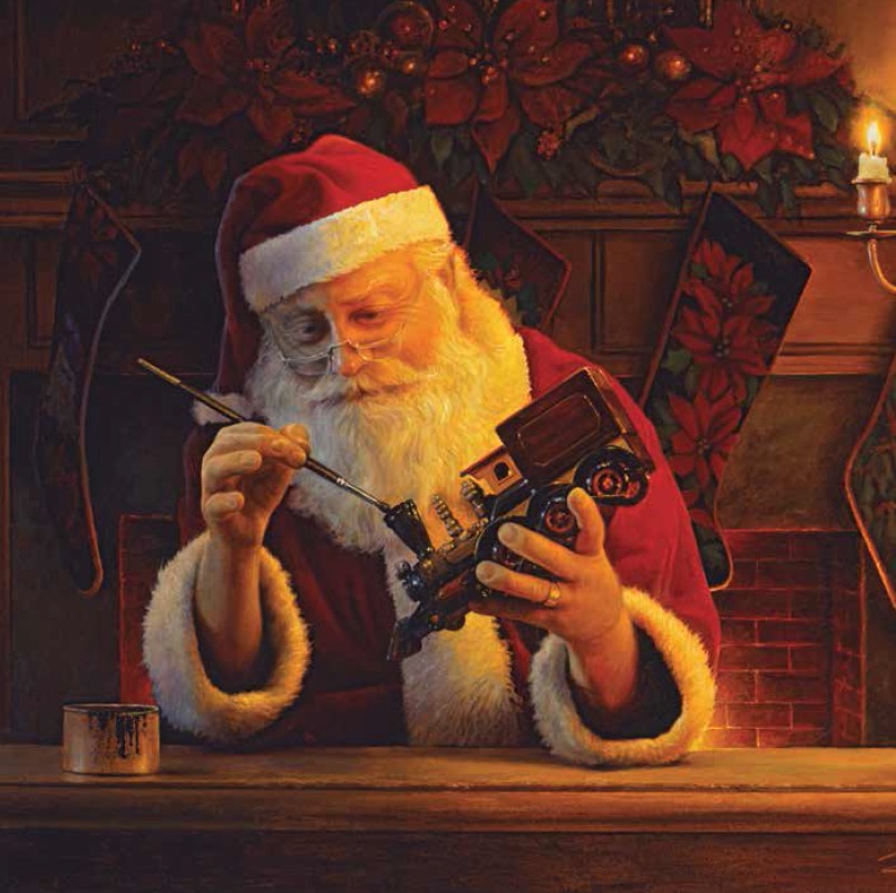 babbo natale babbo natale dipinge un trenino